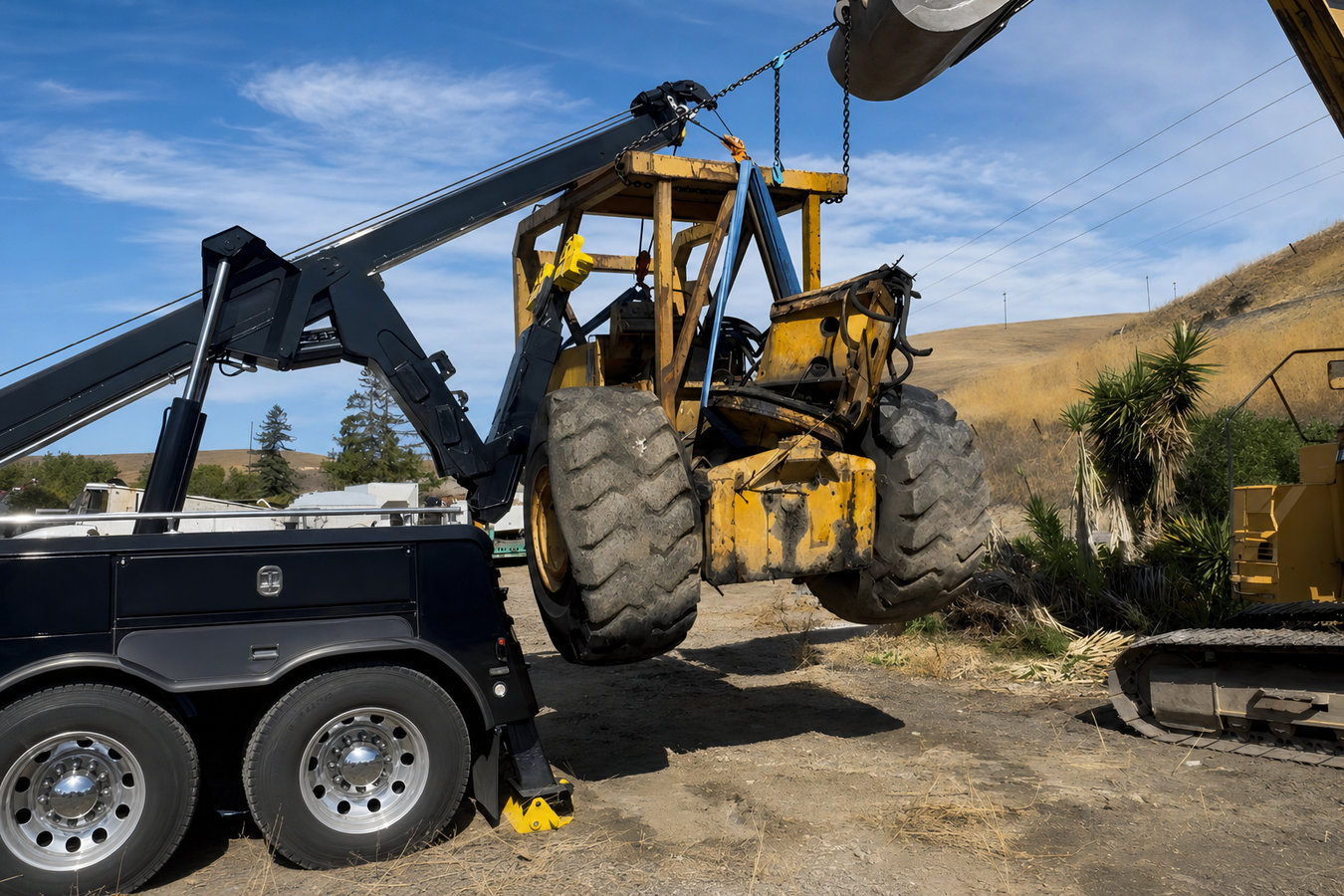 Heavy equipment and machinery towing